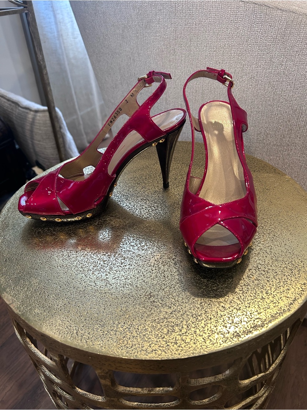 Stuart Weitzman shiny red heels with gold detail